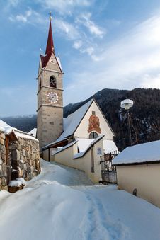A Wintertime View Of A Small Church With A Tall Steeple Royalty Free Stock Photo