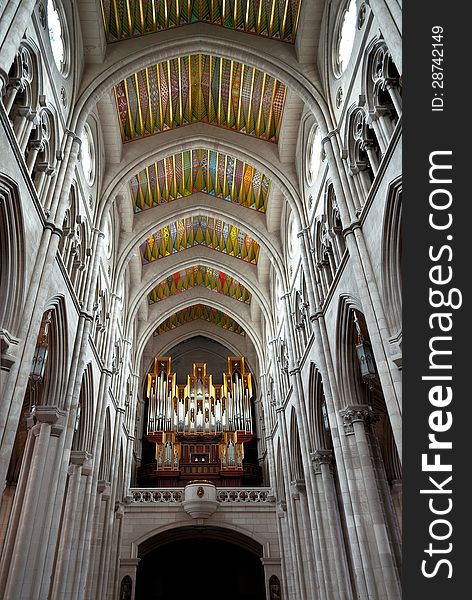 MADRID - APRIL 29: Interior of the Cathedral of Almudena with organ on April 29, 2012 in Madrid. The cathedral was not completed until 1993, when it was consecrated by Pope John Paul II. MADRID - APRIL 29: Interior of the Cathedral of Almudena with organ on April 29, 2012 in Madrid. The cathedral was not completed until 1993, when it was consecrated by Pope John Paul II.