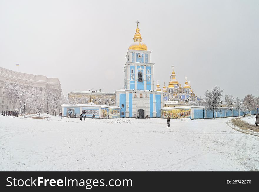Gold domes of temples during the winter period among snow. Gold domes of temples during the winter period among snow