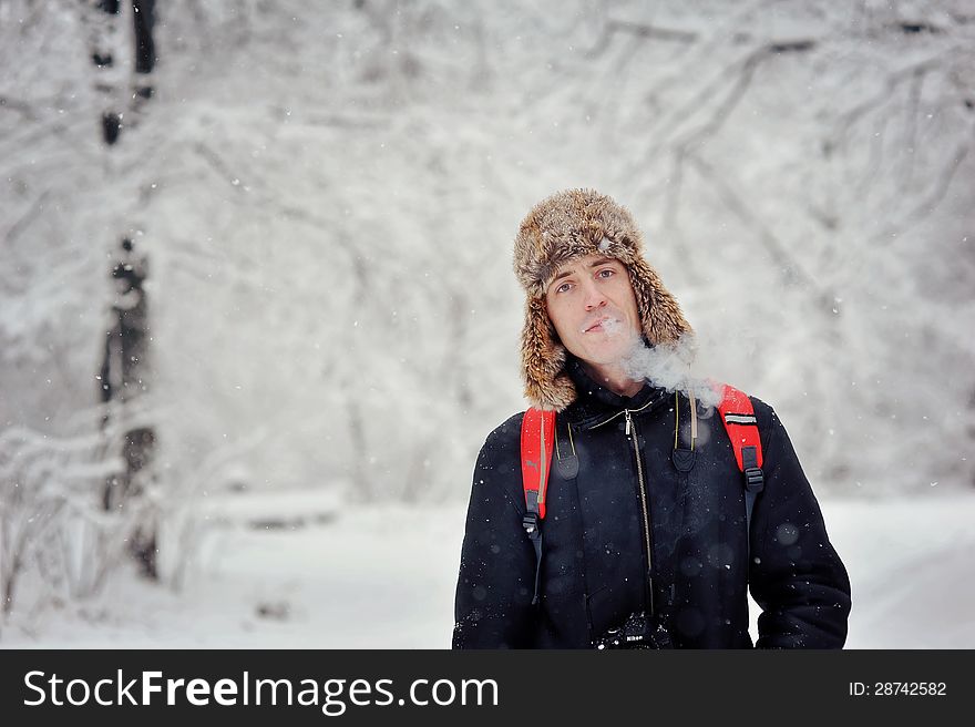 Winter walk on the nature among trees and strong snow. Winter walk on the nature among trees and strong snow