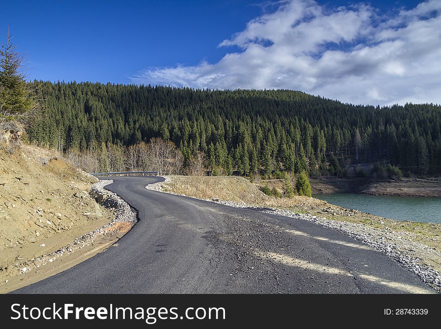 Curved road at mountain in autumn season