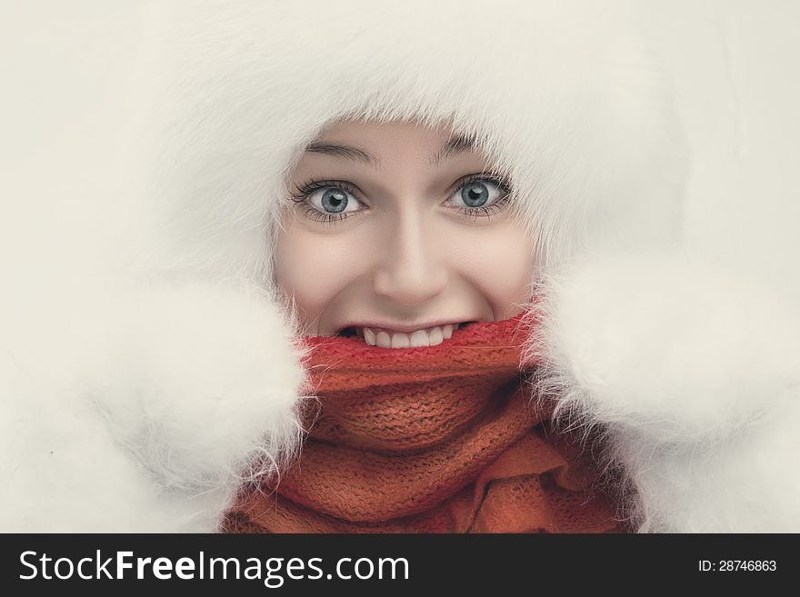 Fashion portrait of young beautiful woman posing on white background