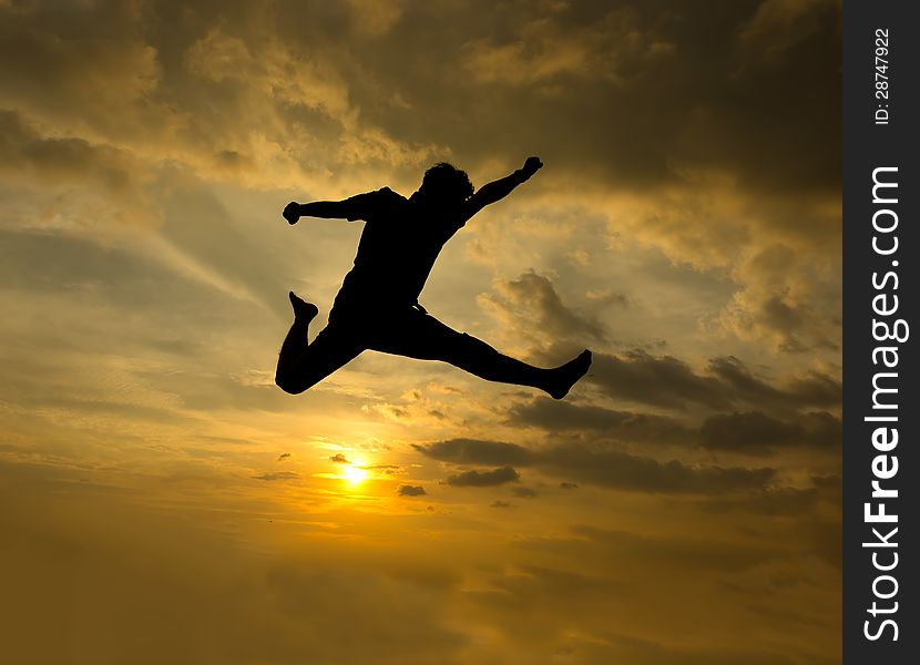 Silhouette Of Man Jumping