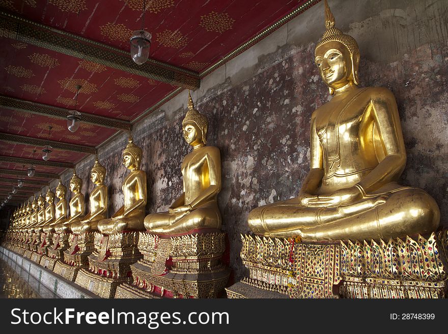 A Row of Buddha Statue in Bangkok, Thailand.
