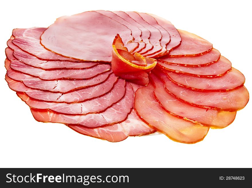 Sliced ham and tenderloin isolated over white background. Sliced ham and tenderloin isolated over white background.