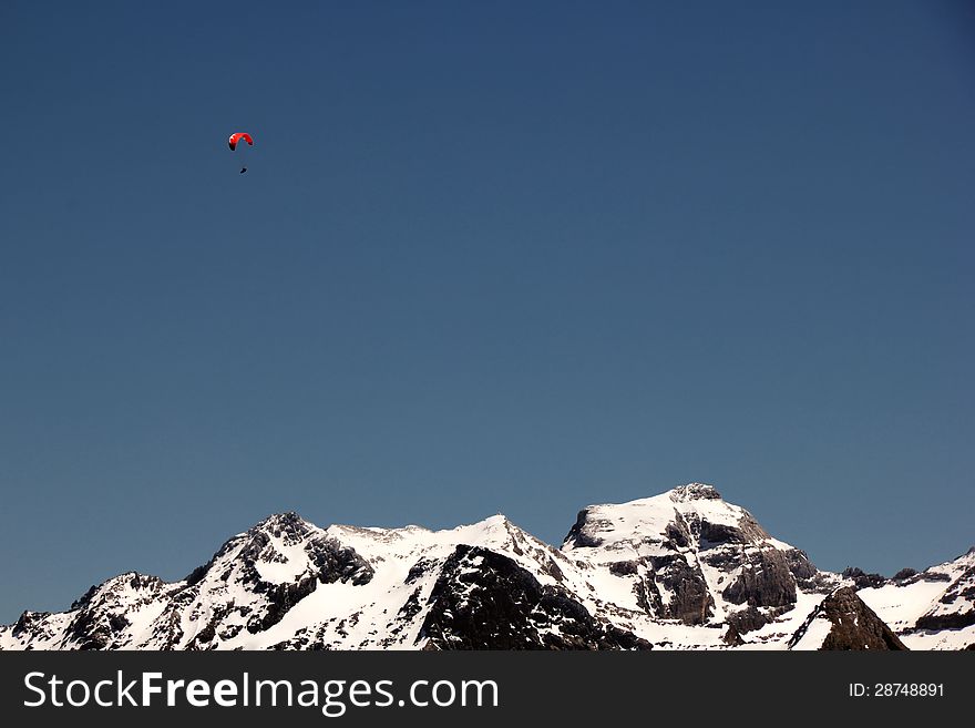 Hang-Glider over the mountains of Aletsch region (Switzerland). Hang-Glider over the mountains of Aletsch region (Switzerland)