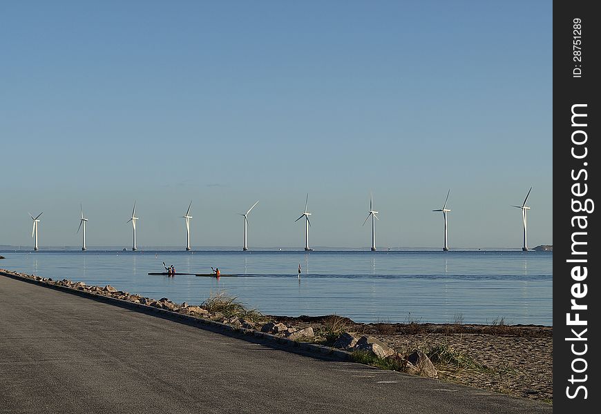 Environmental wind turbines near amager beach, copenhagen, denmark