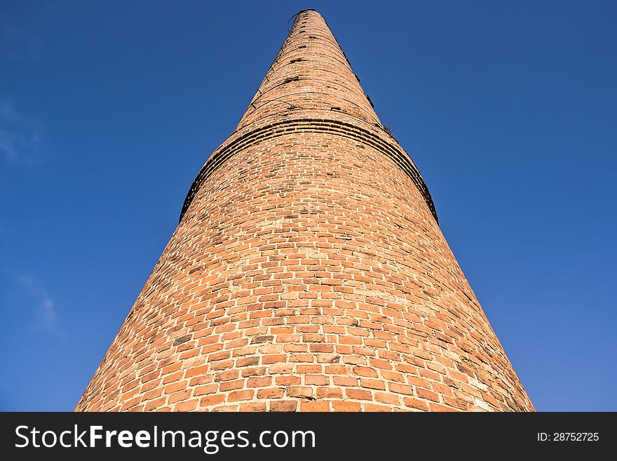 Factory chimney built of brick on the area of former Uthemann Ironworks, Katowice, Poland