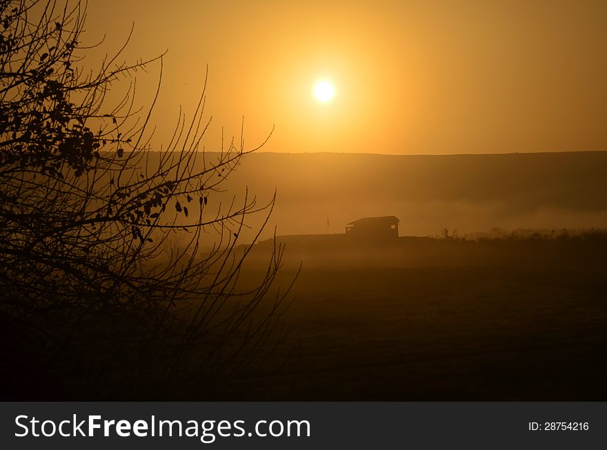 Beautiful house at sunrise in hagamon lake