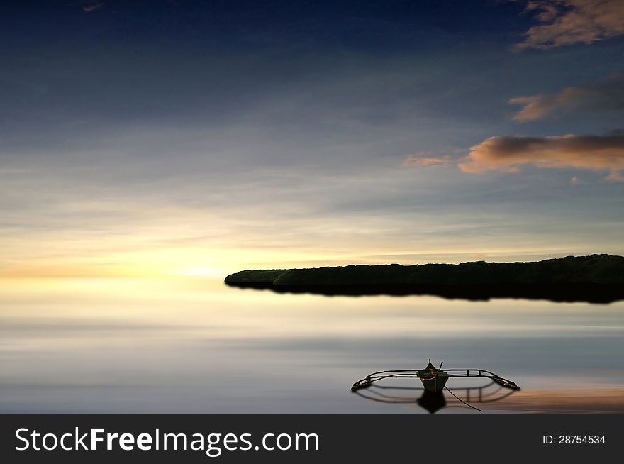 Fisherman&#x27;s boat at sunset