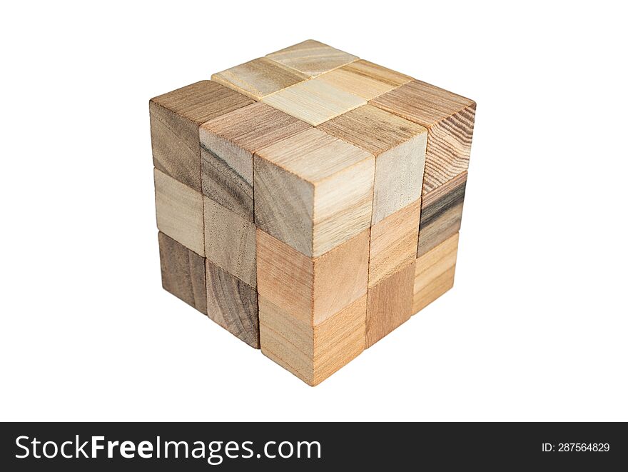 Cube wooden toy made with wooden cubes. Graphic elements and shapes