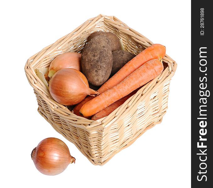 Basket with vegetables on a white background