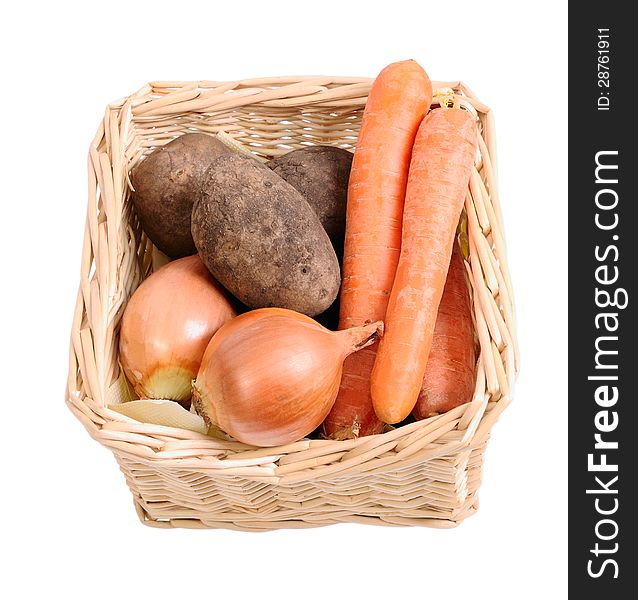 Basket with vegetables on a white background