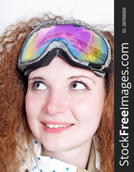 Portrait of pretty snowboarders wearing glasses