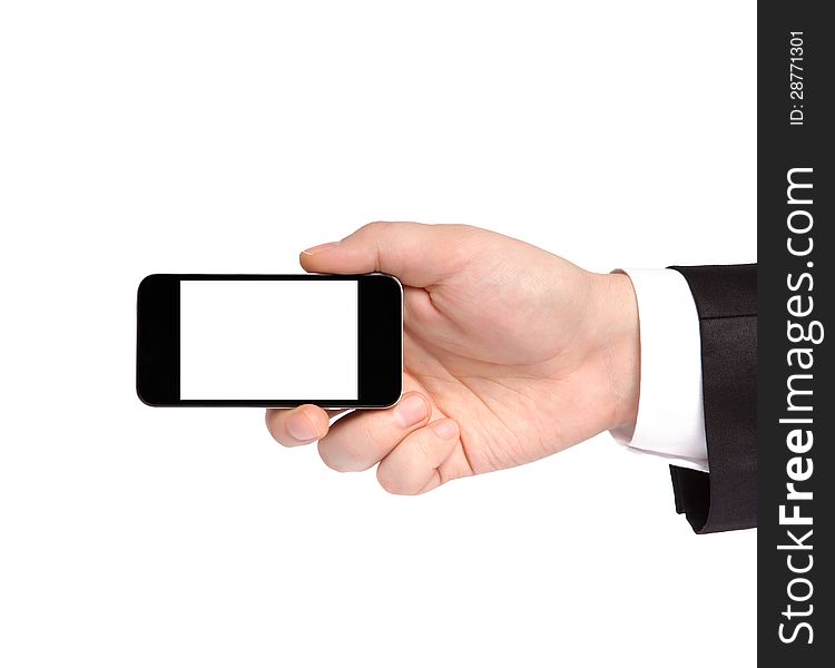 Hand of a businessman in a suit holding a phone tablet touch computer gadget with isolated display. Hand of a businessman in a suit holding a phone tablet touch computer gadget with isolated display