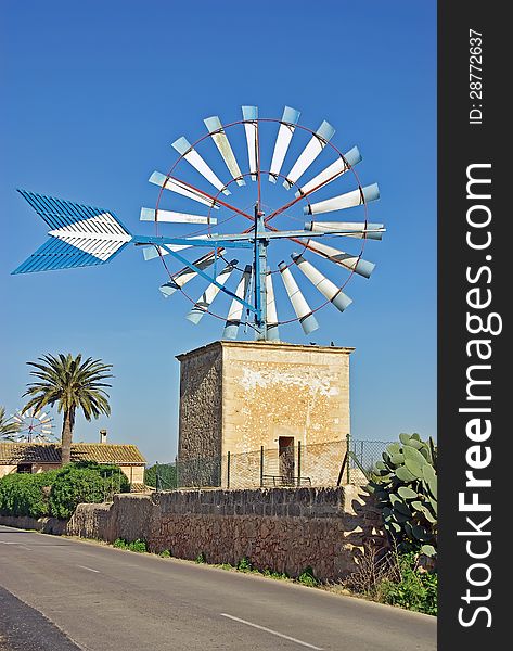 Typical ancient windmill in Majorca rural side