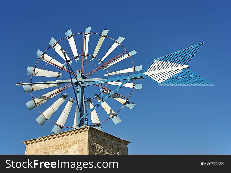 Typical ancient windmill in Majorca rural side