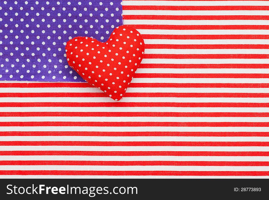 Blue polka dots and Red/white Striped Fabrics as American flag. Stuffed handmade heart. Blue polka dots and Red/white Striped Fabrics as American flag. Stuffed handmade heart