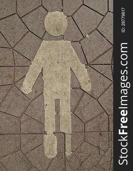 Sign of man on sidewalk is mean way for walking. Sign of man on sidewalk is mean way for walking