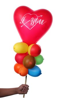 Boy Holding Colorful Balloons With Heart Shape Stock Photos Boy Holding Colorful Balloons With Heart Shape Stock Photos