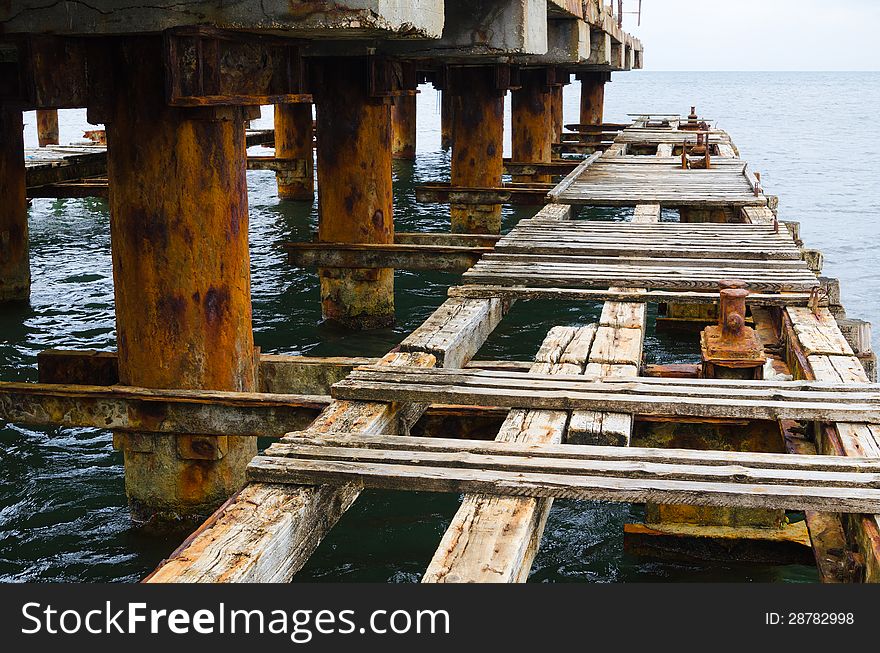 Deserted old bridge floor. rusty and unusable. ferroconcrete construction