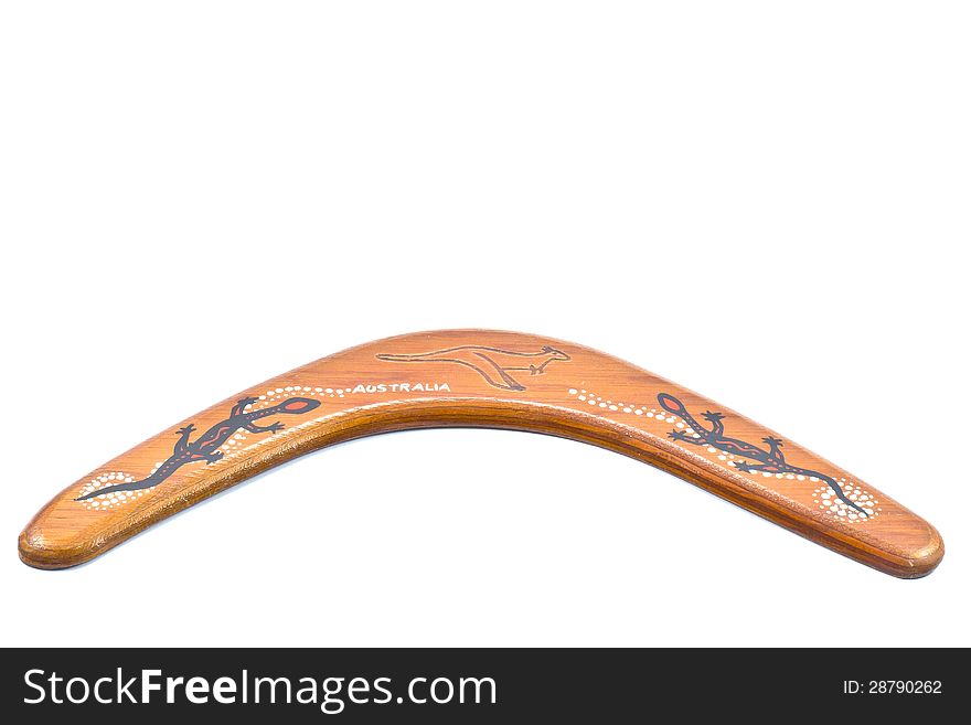 Wooden boomerang from Australia with white background