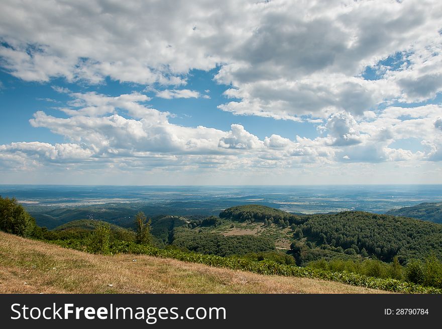 Beautiful sunny landscape with cloudy skies. Beautiful sunny landscape with cloudy skies