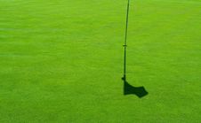 Golf Green And A Flag Shadow Stock Image