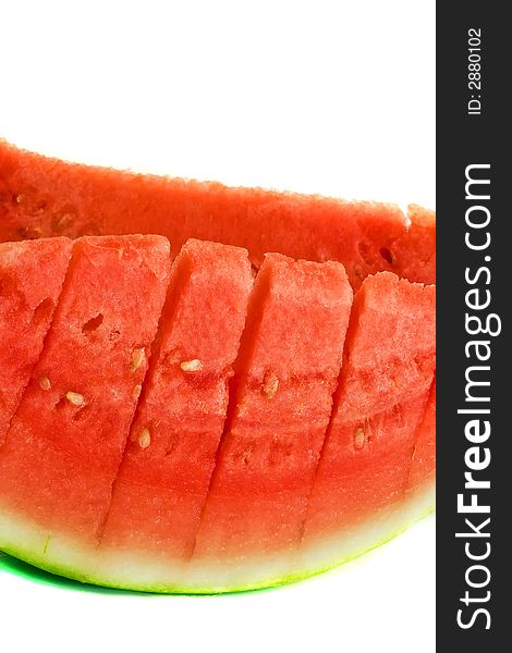 A fresh pair of red and green slices of watermelon. A fresh pair of red and green slices of watermelon