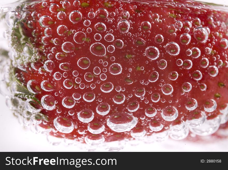 Red strawberry fruit and bubble water drink