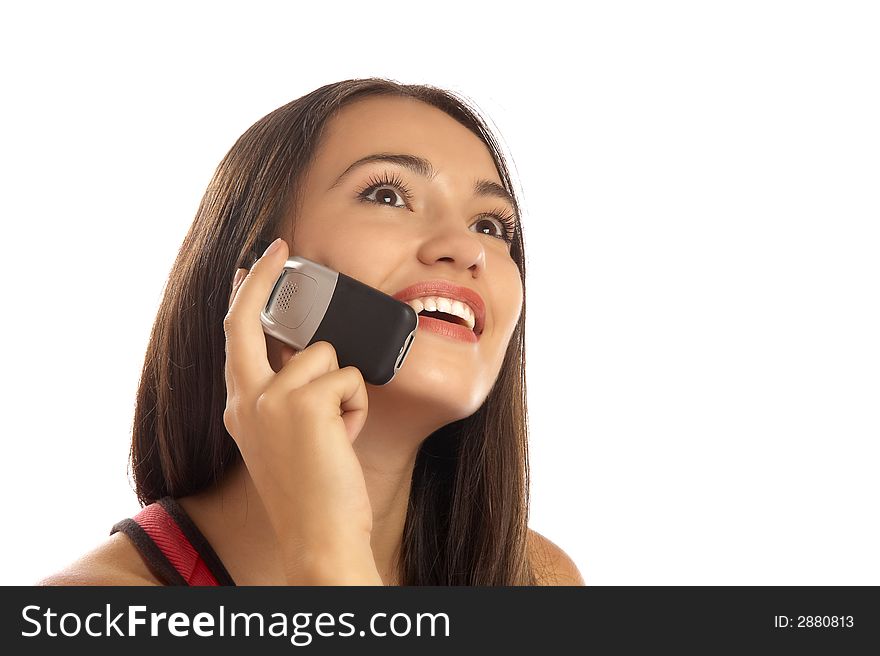 Portrait of young cute brunette calling by mobile phone. Portrait of young cute brunette calling by mobile phone