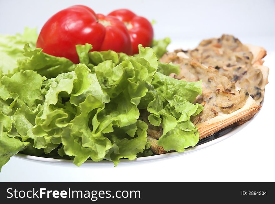 Sandwiches with salad and tomatoes