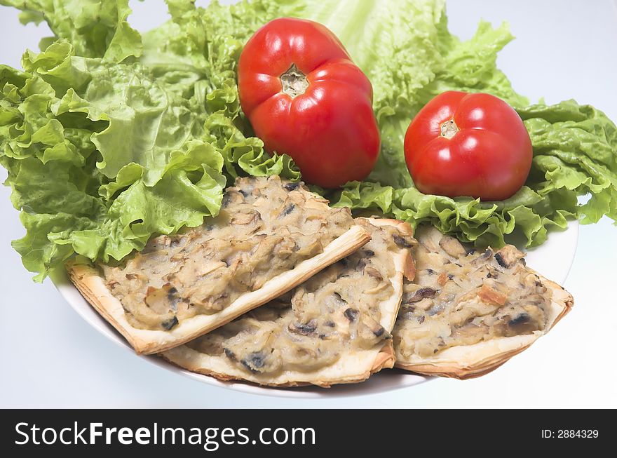 Sandwiches with salad and tomatoes