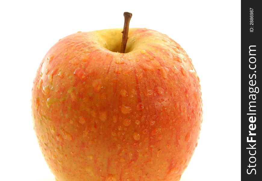 Shiny wet piece of apple on white background