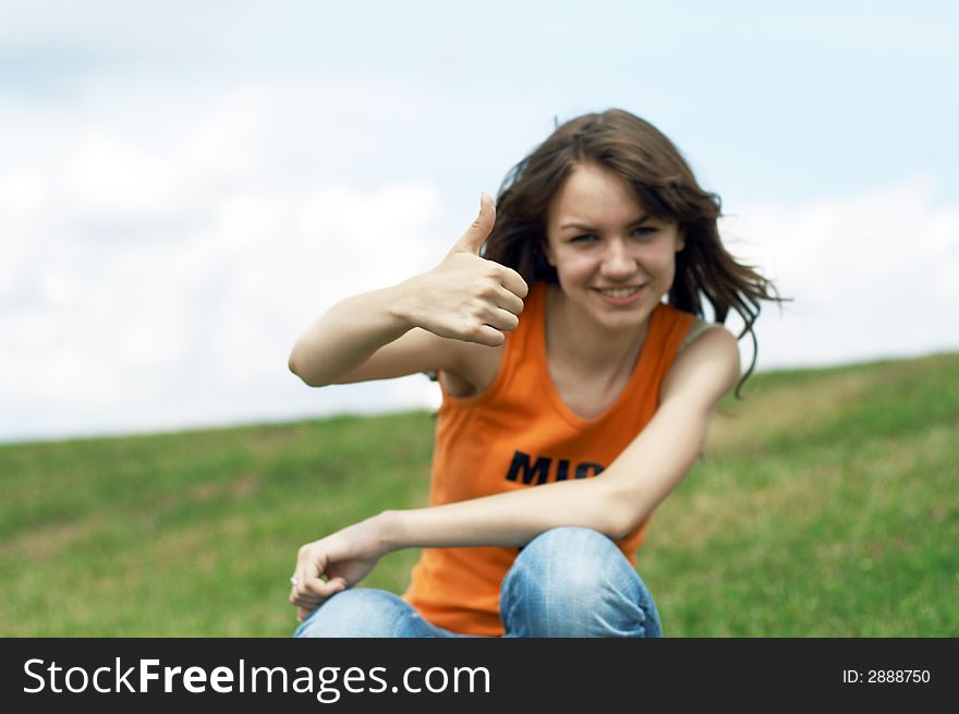 Girl showing the OK sign. Girl showing the OK sign