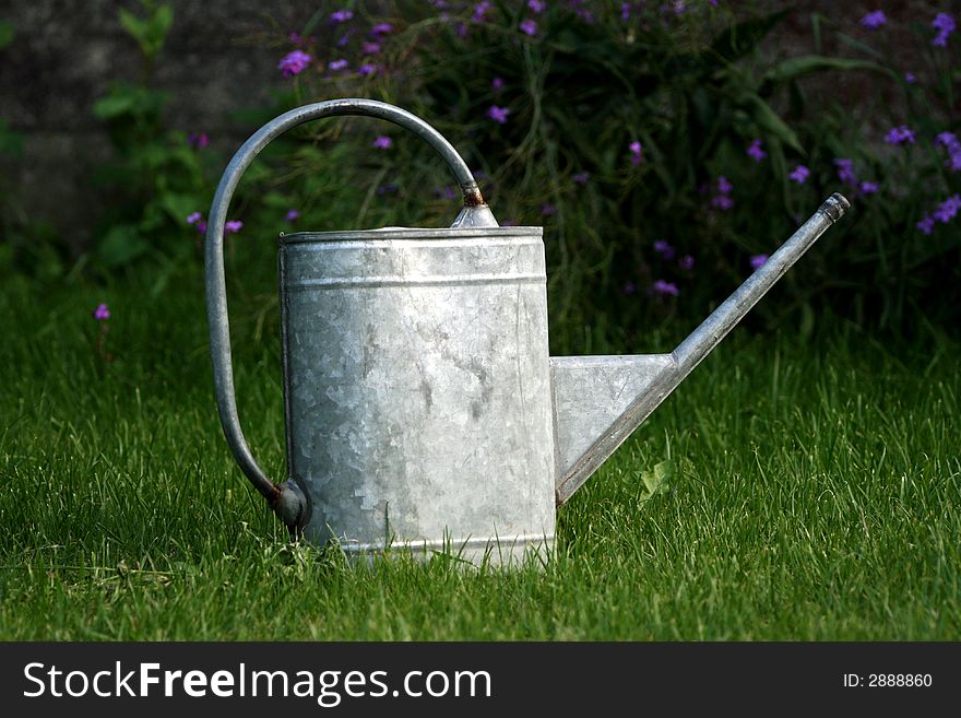 Watering can in garden