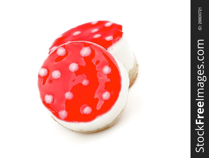 Two Polka Dot Cheesecakes with Strawberry Jelly closeup on white background