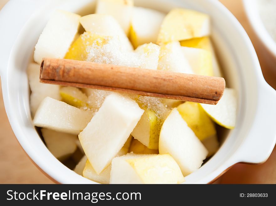 Slices Of Pear And Cinnamon In A Pot