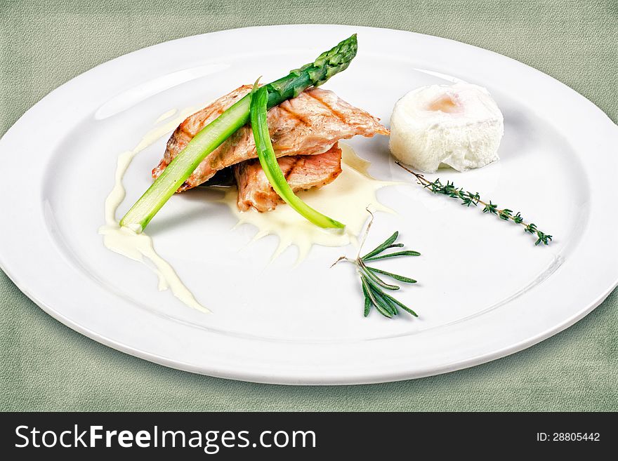 Restaurant dish consisting of fish and eggs with herbs. Restaurant dish consisting of fish and eggs with herbs