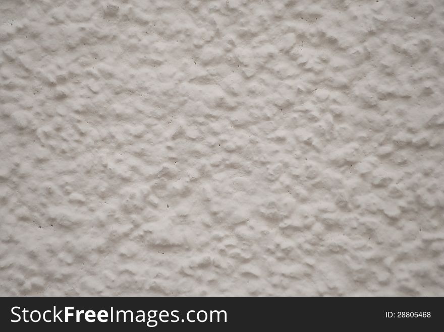 Seamless white painted concrete wall texture/background. Seamless white painted concrete wall texture/background.