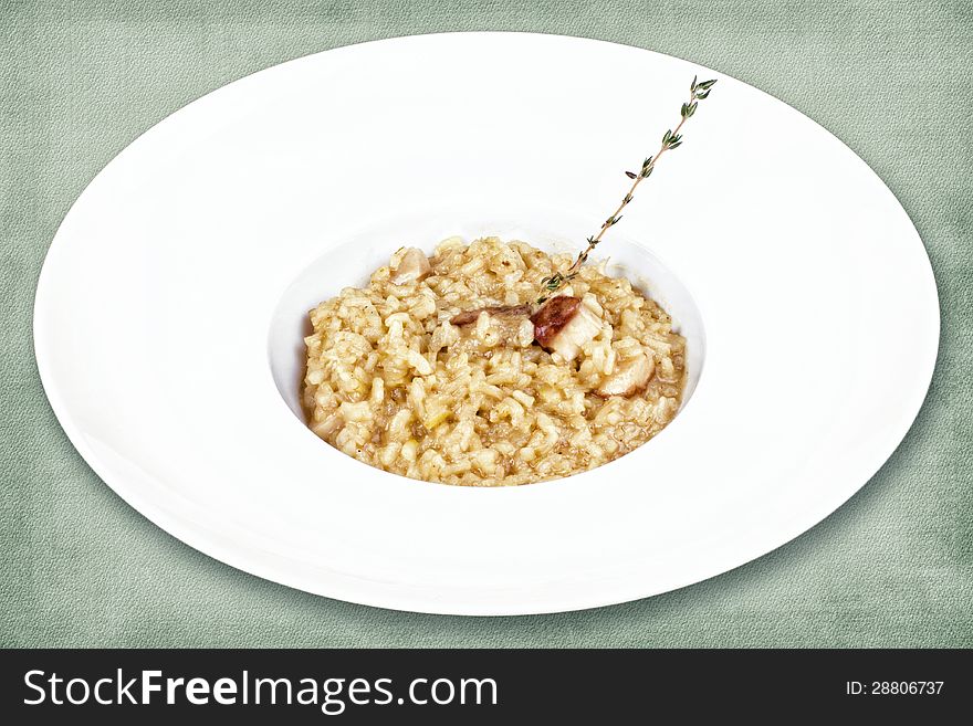 Restaurant dish consisting of rice with mushrooms and herbs. Restaurant dish consisting of rice with mushrooms and herbs