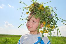 Boy With Wreath Stock Images