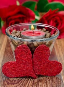 Red Candle In A Glass Cup With Coffee Beans And Two Hearts Stock Photos Red Candle In A Glass Cup With Coffee Beans And Two Hearts Stock Photos