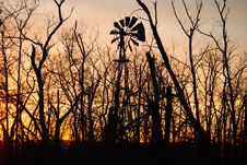 Windmill In Trees Royalty Free Stock Image