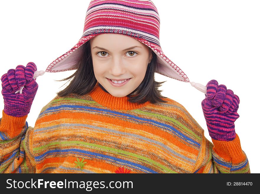 Beautiful young girl in warm winter clothes isolated on white