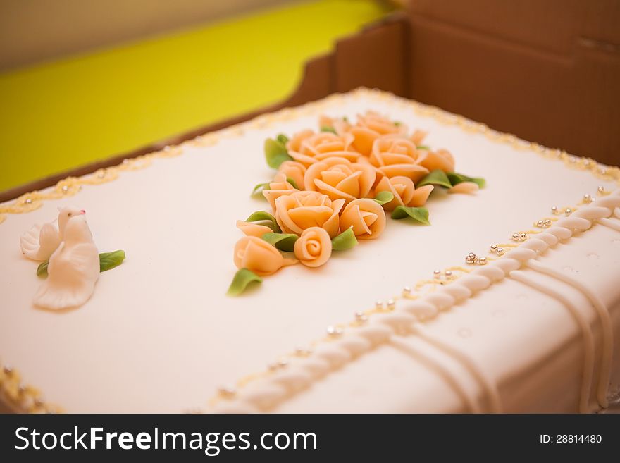 Wedding cake with two doves and sugar flowers. Wedding cake with two doves and sugar flowers