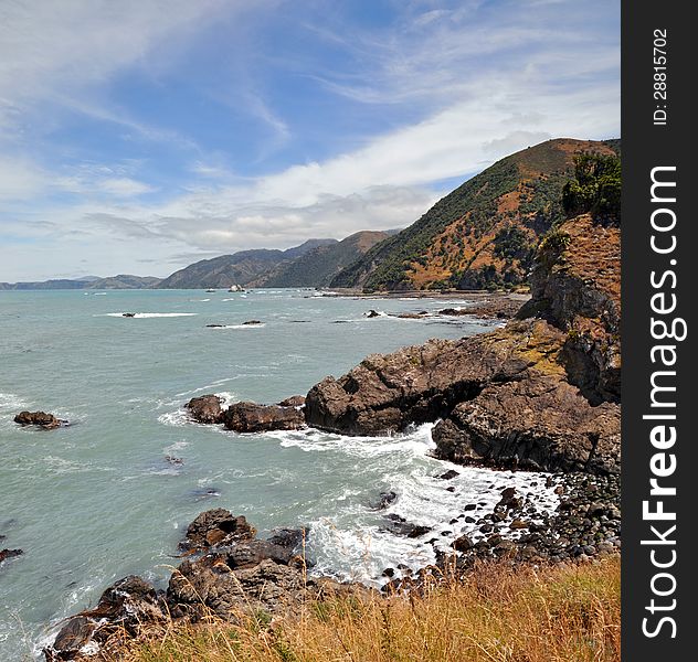 Vertical panoramic view of the rocky coast of Kaikoura - a popular seal colony and whale watching tourist destination on the east coast of the South Island in New Zealand. Vertical panoramic view of the rocky coast of Kaikoura - a popular seal colony and whale watching tourist destination on the east coast of the South Island in New Zealand.