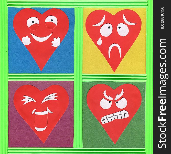 Colorful paper cutout with funny heart faces. Colorful paper cutout with funny heart faces