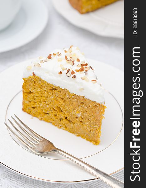 Piece Of Pumpkin Cake With Cream Closeup