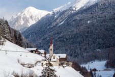 A Wintertime View Of A Small Church With A Tall Steeple Royalty Free Stock Photos